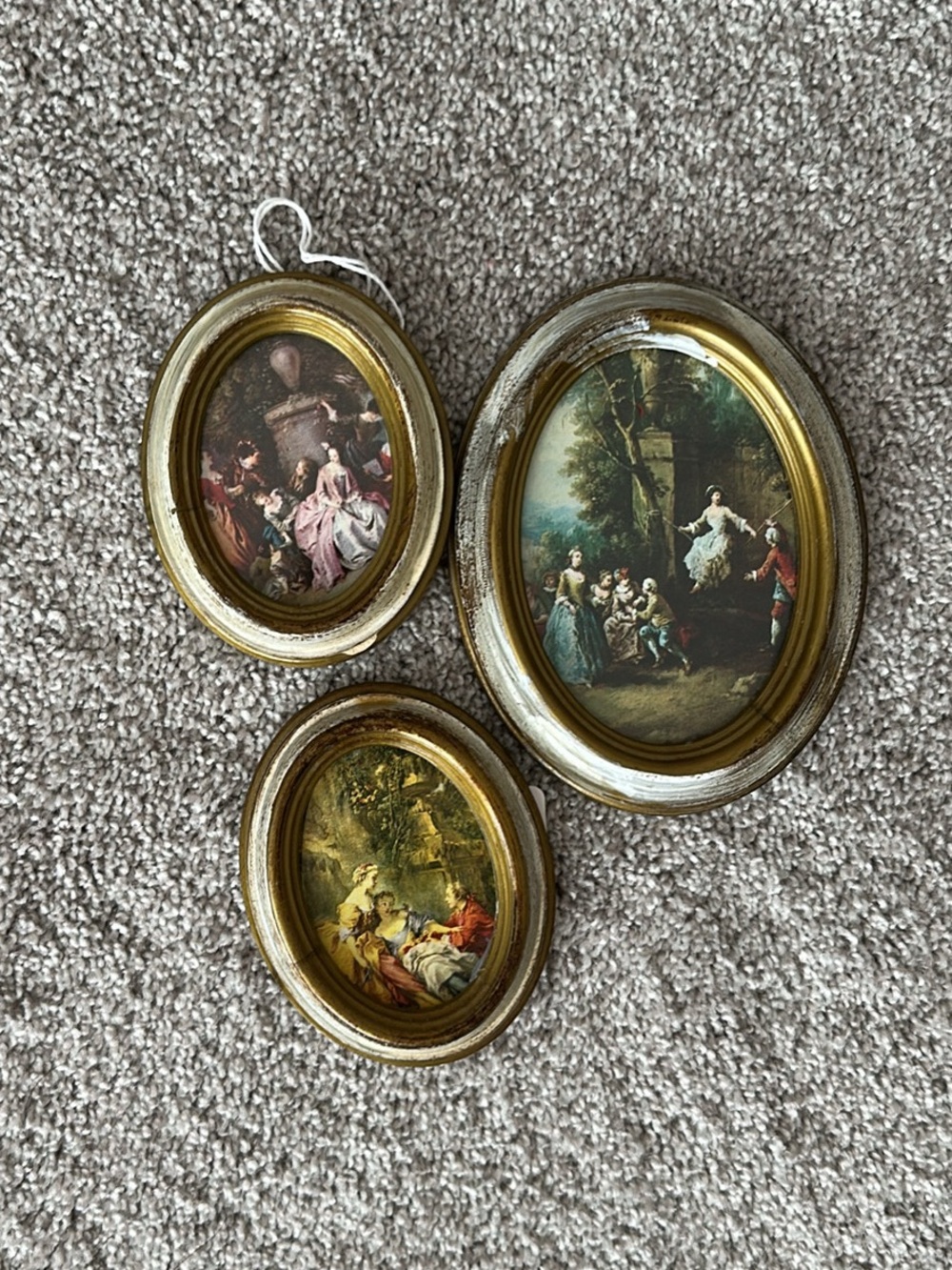 Florentine oval framed art pieces
